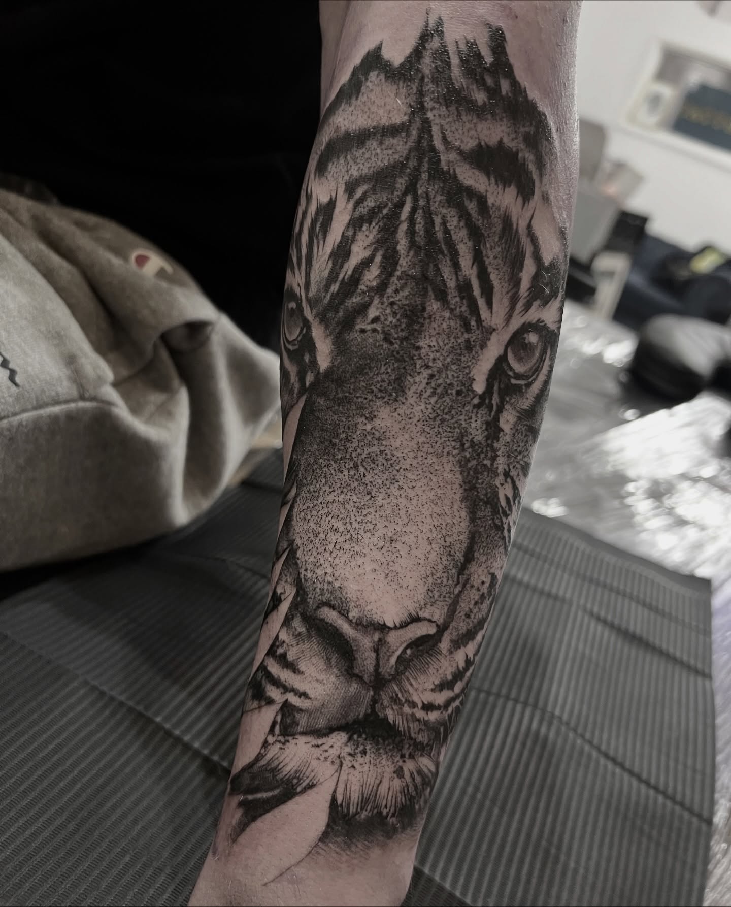 Thanks Leon. Killer first tattoo, more to come to create a half sleeve. Done by @joshwilding #blackandgreytattoo #tiger #portrait #realism #tattoo