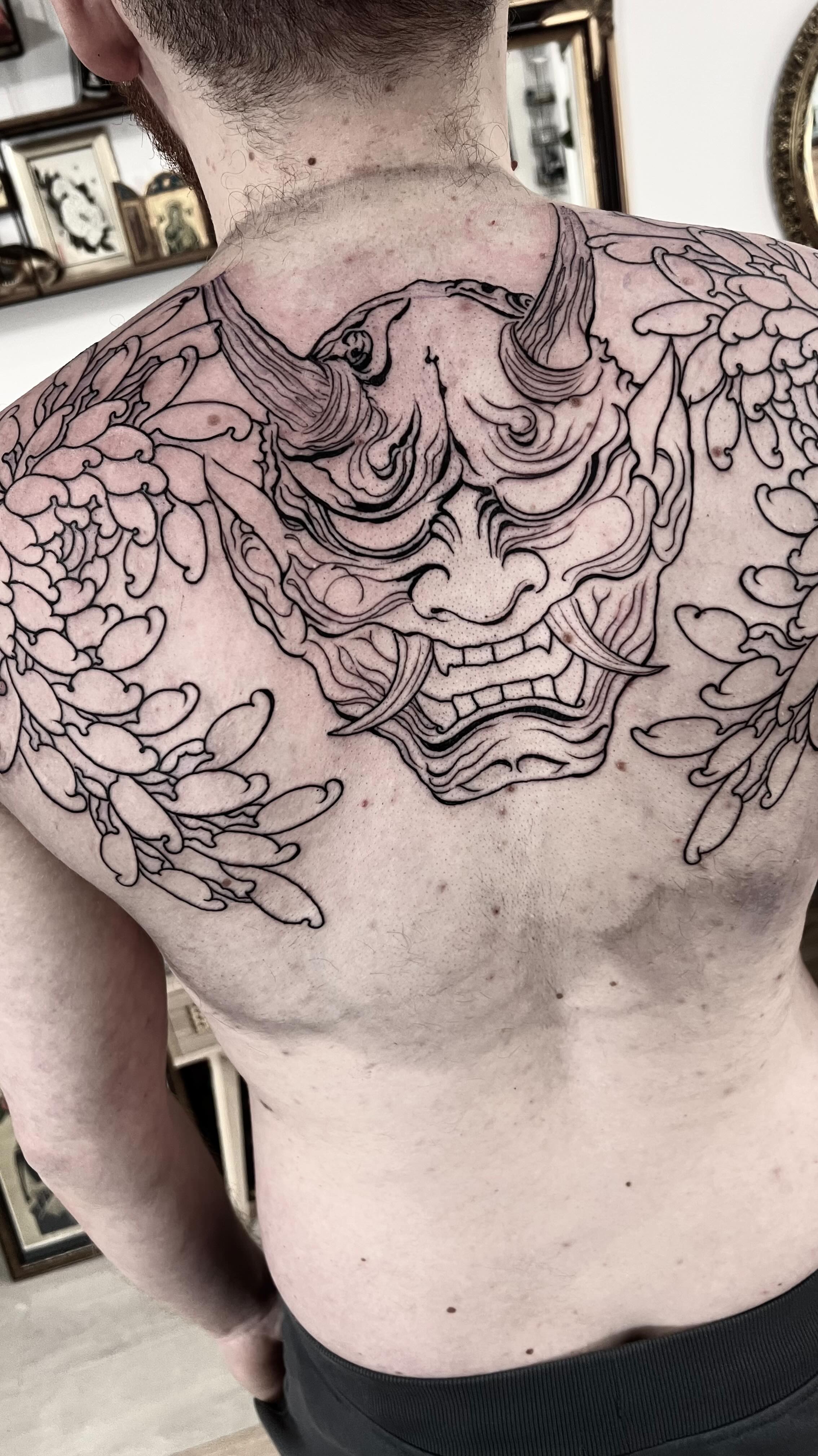 New upper back project by @joshwilding this is a Hanya mask and chrysanthemum flower. To be completed in black and grey. DM for enquires about this style. #back #backtattoo #japanese #japanesetattoo #blackandgreytattoo