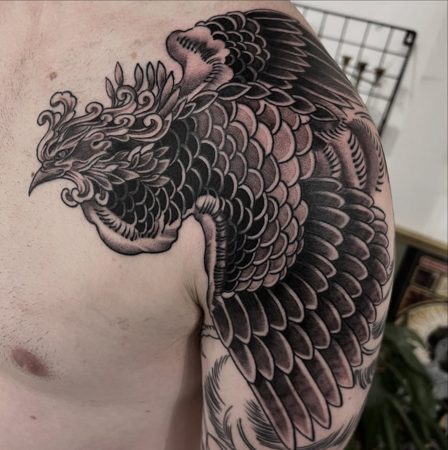 One more session to complete this shoulder, chest and half sleeve phoenix. Background and tail feathers to go. Thanks @paynesam for choosing another cool project. Done by @joshwilding #phoenix #japanese #tradtattoos #traditional #newtattoo #tattoos #tattooideas #sleeve #sleevetattoo