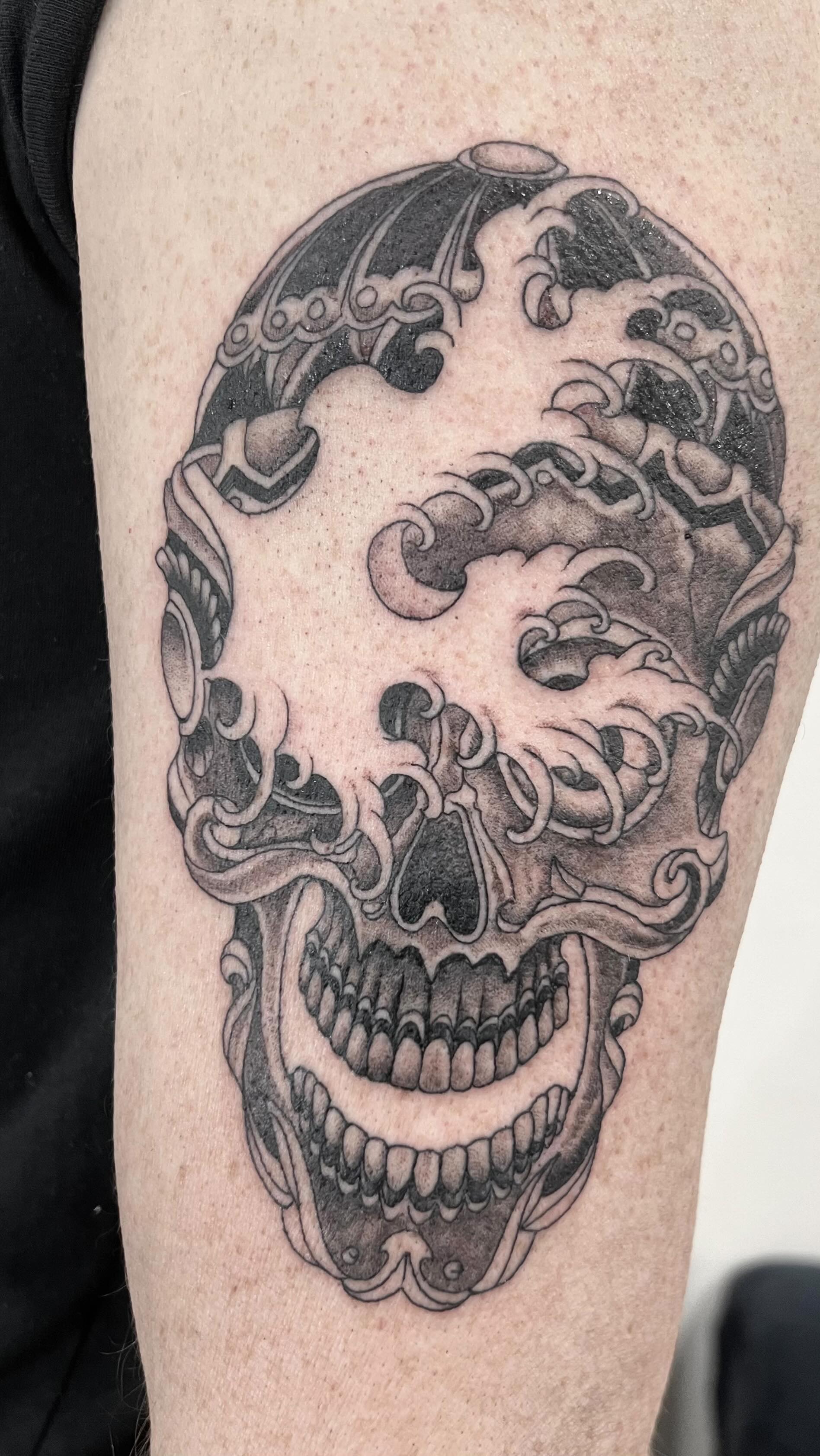 “The Tibetan skull is a masterpiece of craftsmanship and spirituality. The intricate carvings tell a story of transformation and wisdom, and it has become a focal point for meditation space. Its energy feels grounding yet profound, reminding me of the impermanence of life and the beauty of mindfulness. Truly a one-of-a-kind piece that inspires reflection and reverence every day!” This was made for Tim and is a second arm starting after we completed his first sleeve (videos to come). DM to book yours ! #japanese #tibet #tibetan #skull #blackandgreytattoo #blackandgrey