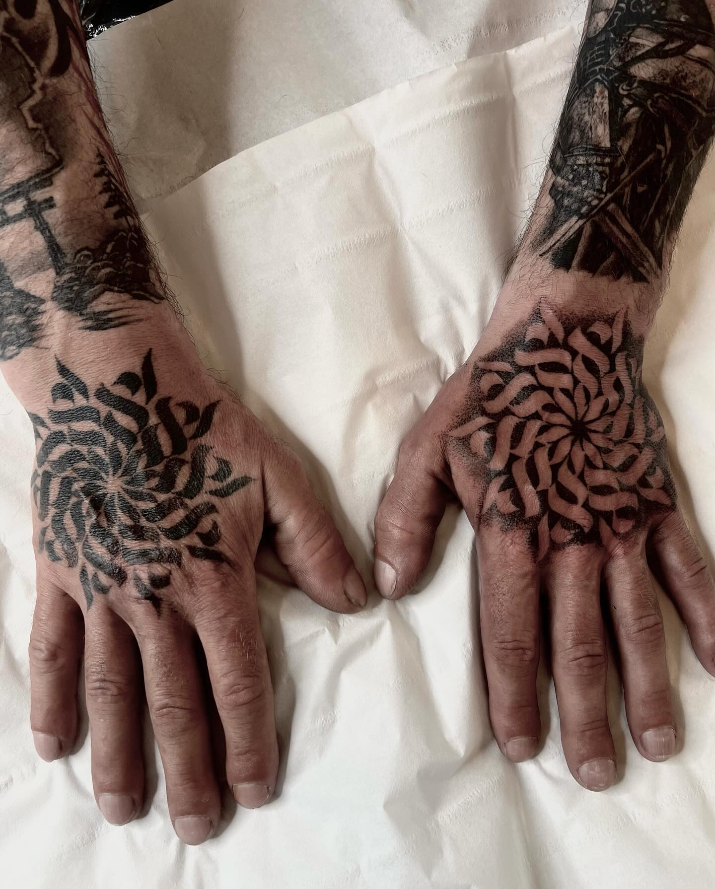 Thanks Matt. Enjoyed using the same design but inverting the shading to create a ‘same same but different’ set of hands. Based on a Tibetan script. #script #tibet #tibetan #hand #handtattoo #pattern #ink